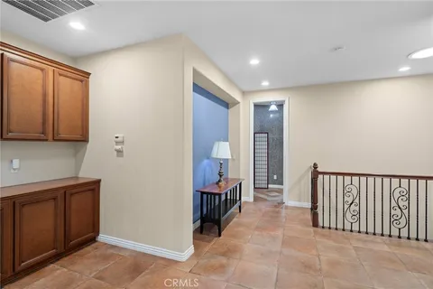 a view of a hallway with workspace