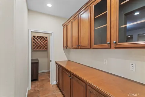 a kitchen with a refrigerator and a sink