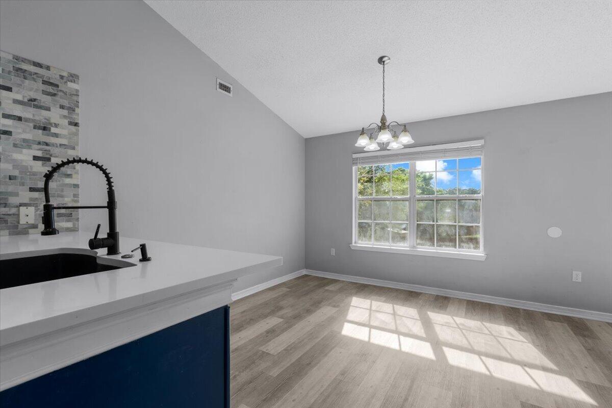 427 Triton Street Crestview, FL 32536 - Photo 17 of 43 a room with window and entryway