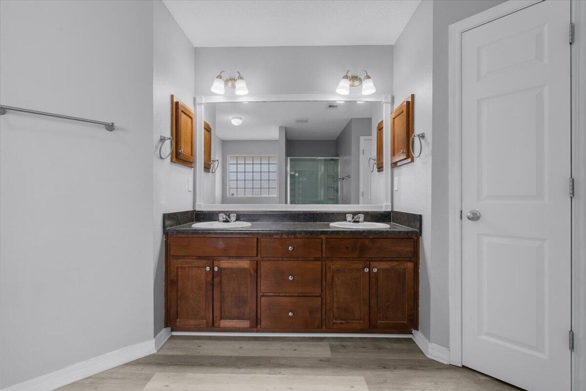 427 Triton Street Crestview, FL 32536 - Photo 22 of 43 a bathroom with a sink and a mirror