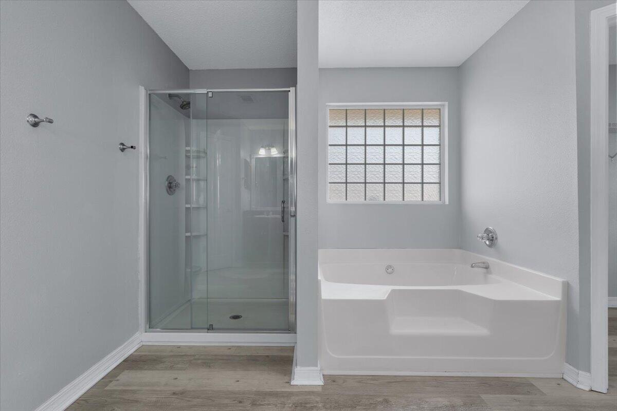 427 Triton Street Crestview, FL 32536 - Photo 23 of 43 a bathroom with a bathtub and shower