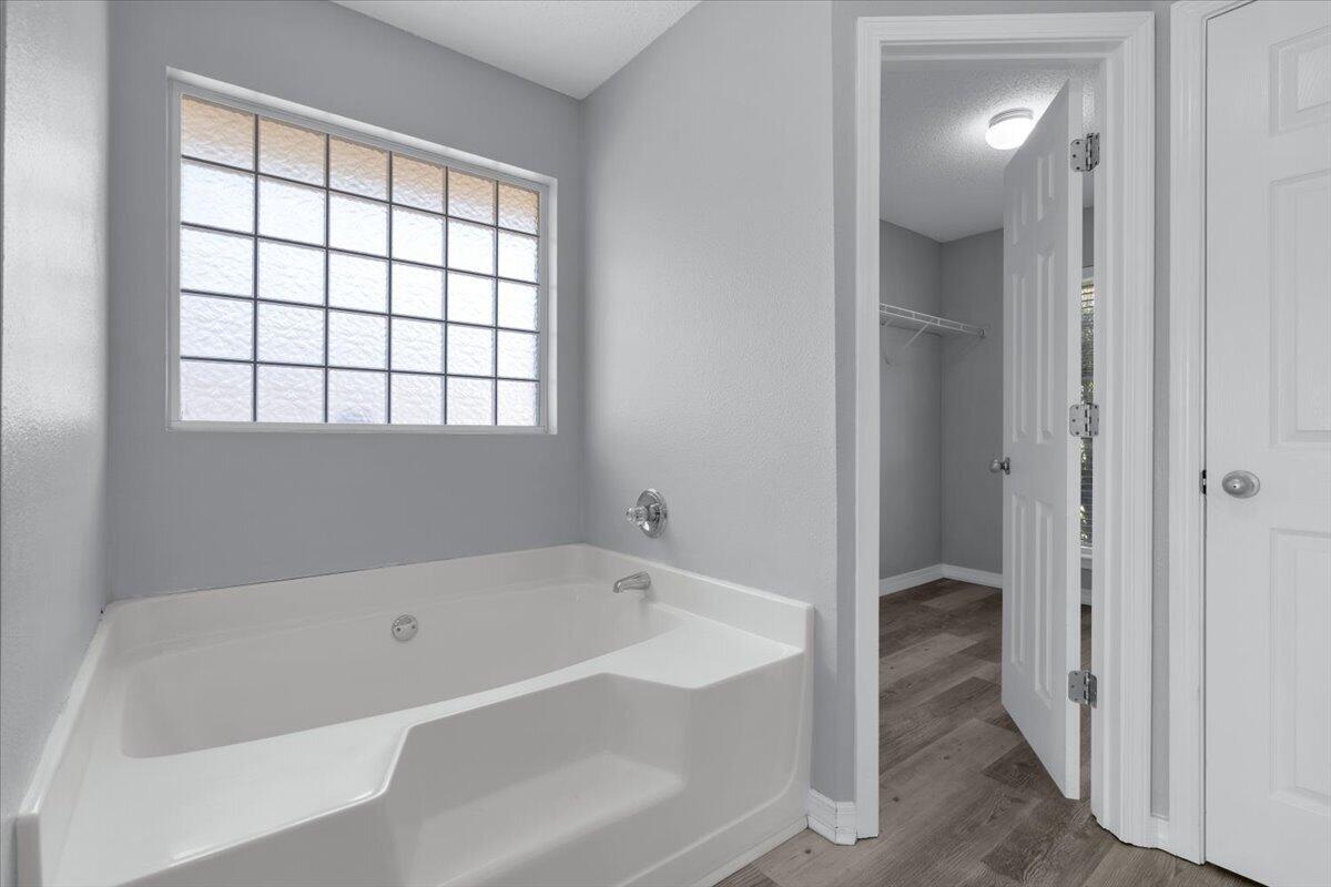 427 Triton Street Crestview, FL 32536 - Photo 24 of 43 a white bath tub sitting next to a window