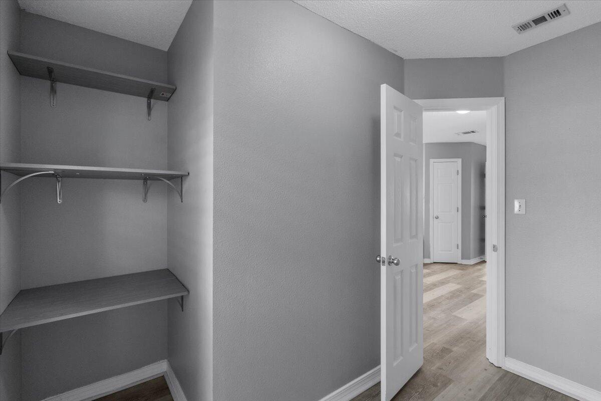 427 Triton Street Crestview, FL 32536 - Photo 29 of 43 a view of an empty walk in closet