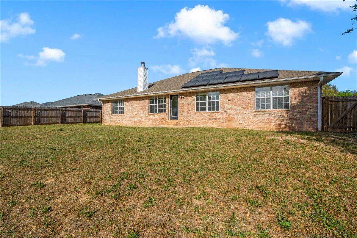427 Triton Street Crestview, FL 32536 - Photo 39 of 43 a front view of a house with yard