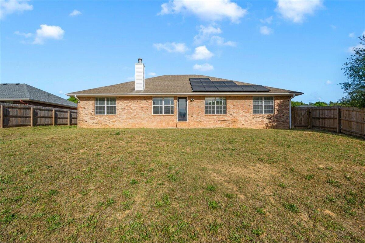 427 Triton Street Crestview, FL 32536 - Photo 40 of 43 a front view of a house with garden