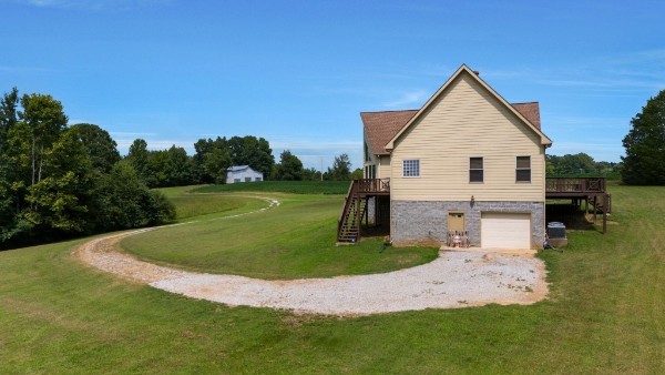 4664 New Cut Road Greenbrier, TN 37073 - Photo 55 of 85 a view of a house with a yard and sitting area