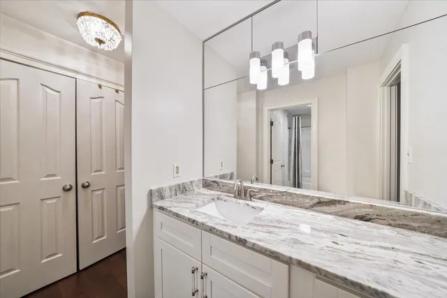 a view of entryway with stairs and wooden floor