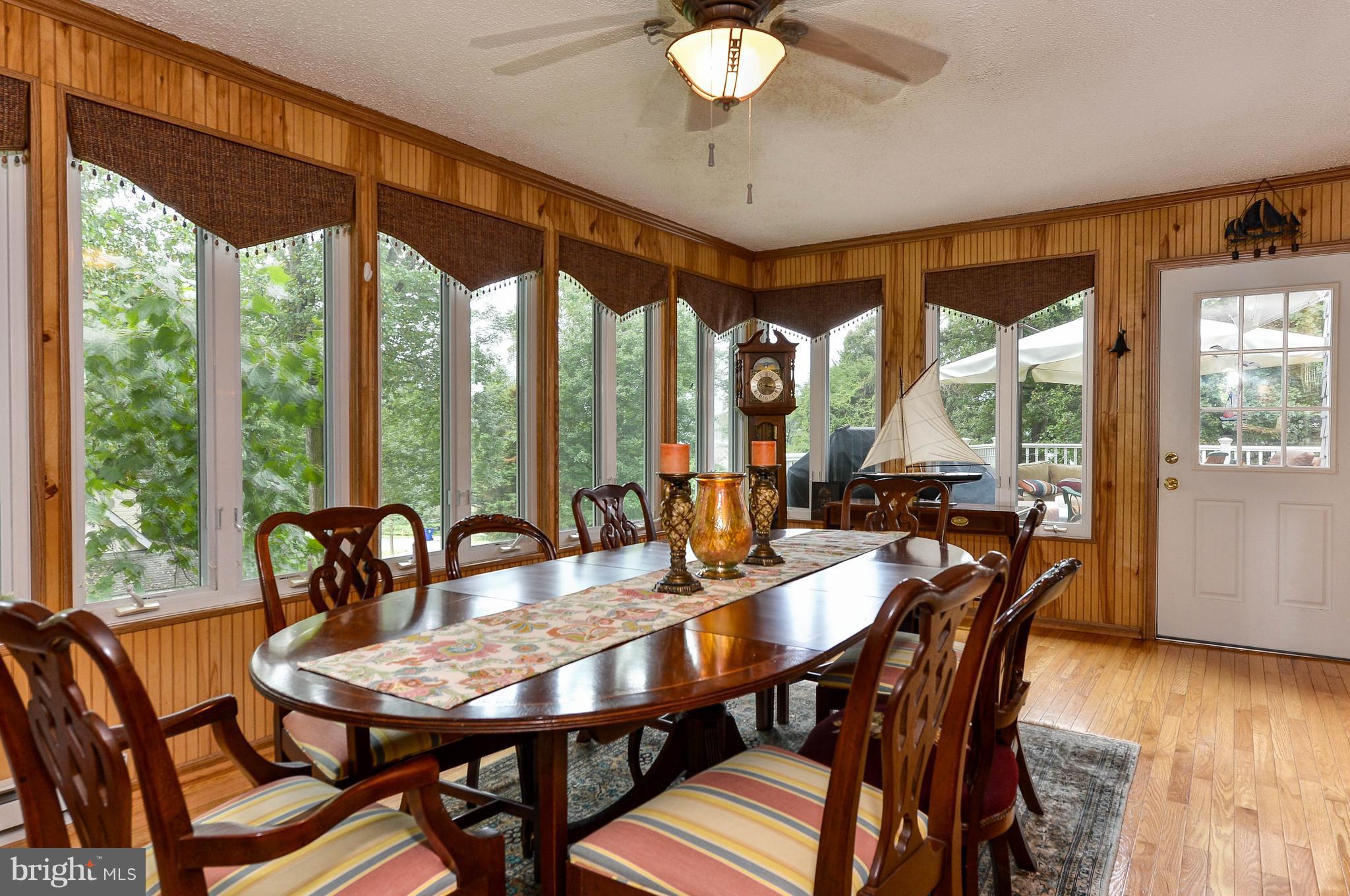 104 Tower Point Road Chesapeake City, MD 21915 - Photo 11 of 30 Access from Dining rm to wrap around deck