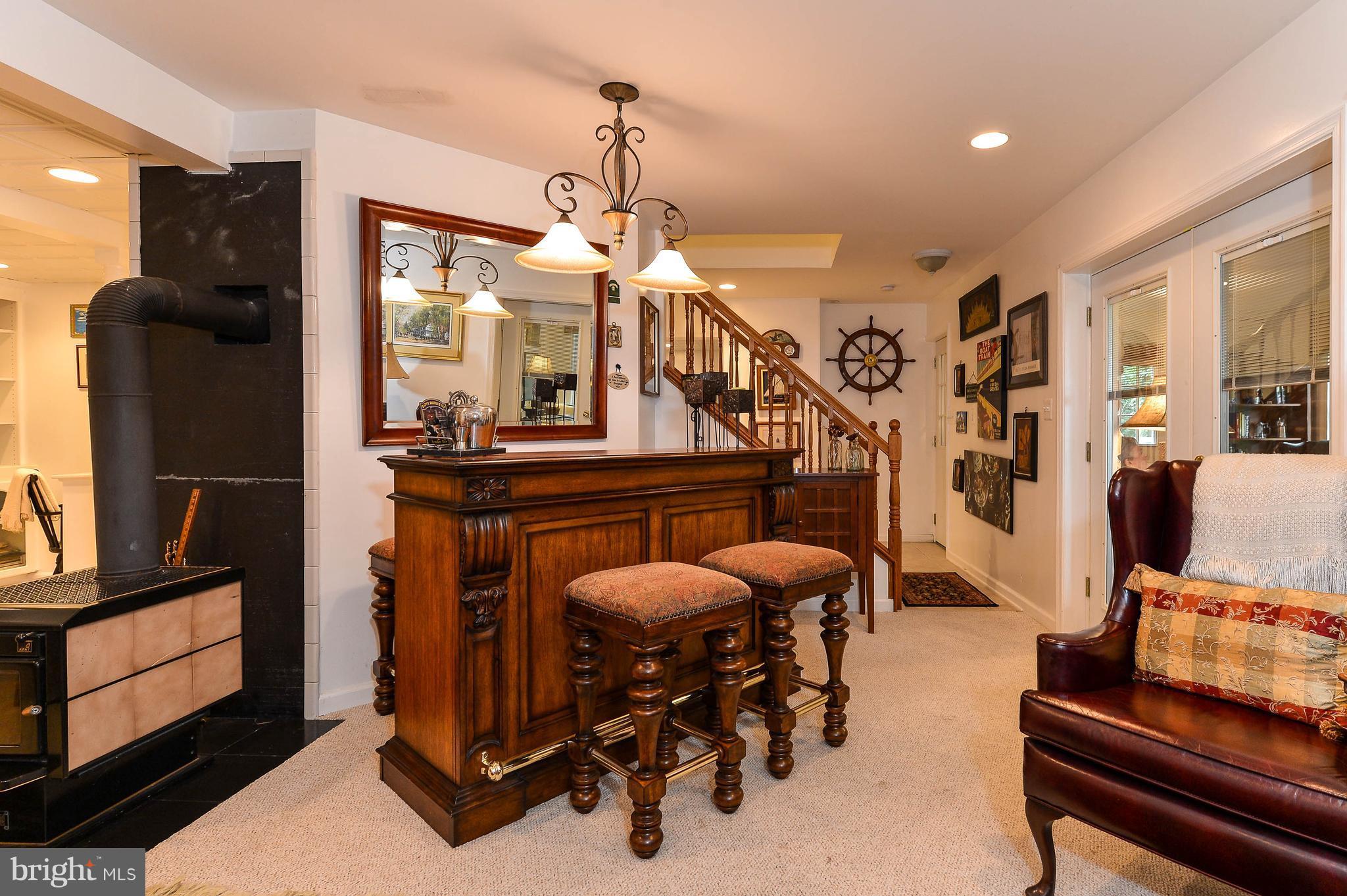 104 Tower Point Road Chesapeake City, MD 21915 - Photo 24 of 30 Accented w/wood stove for chilly evenings