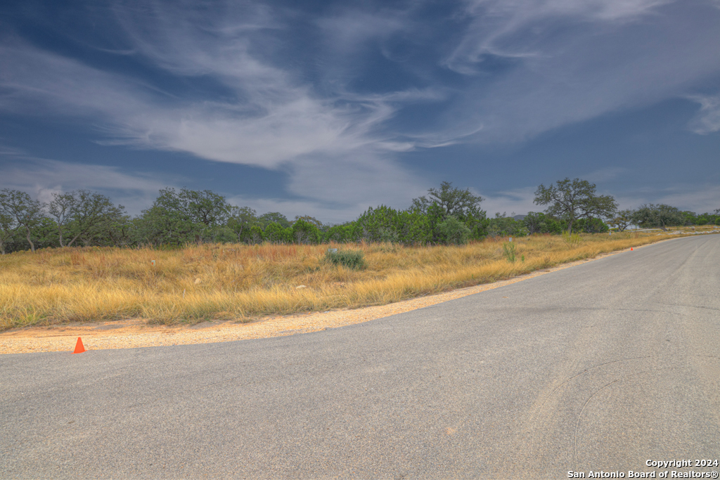 1416 Powder Ridge New Braunfels, TX 78132 - Photo 11 of 33 a view of lake and mountain in the back