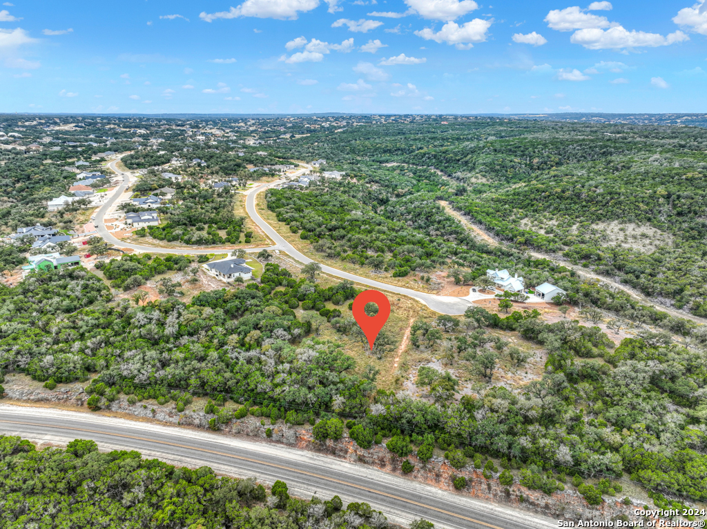 1416 Powder Ridge New Braunfels, TX 78132 - Photo 17 of 33 an aerial view of residential houses with outdoor space and trees