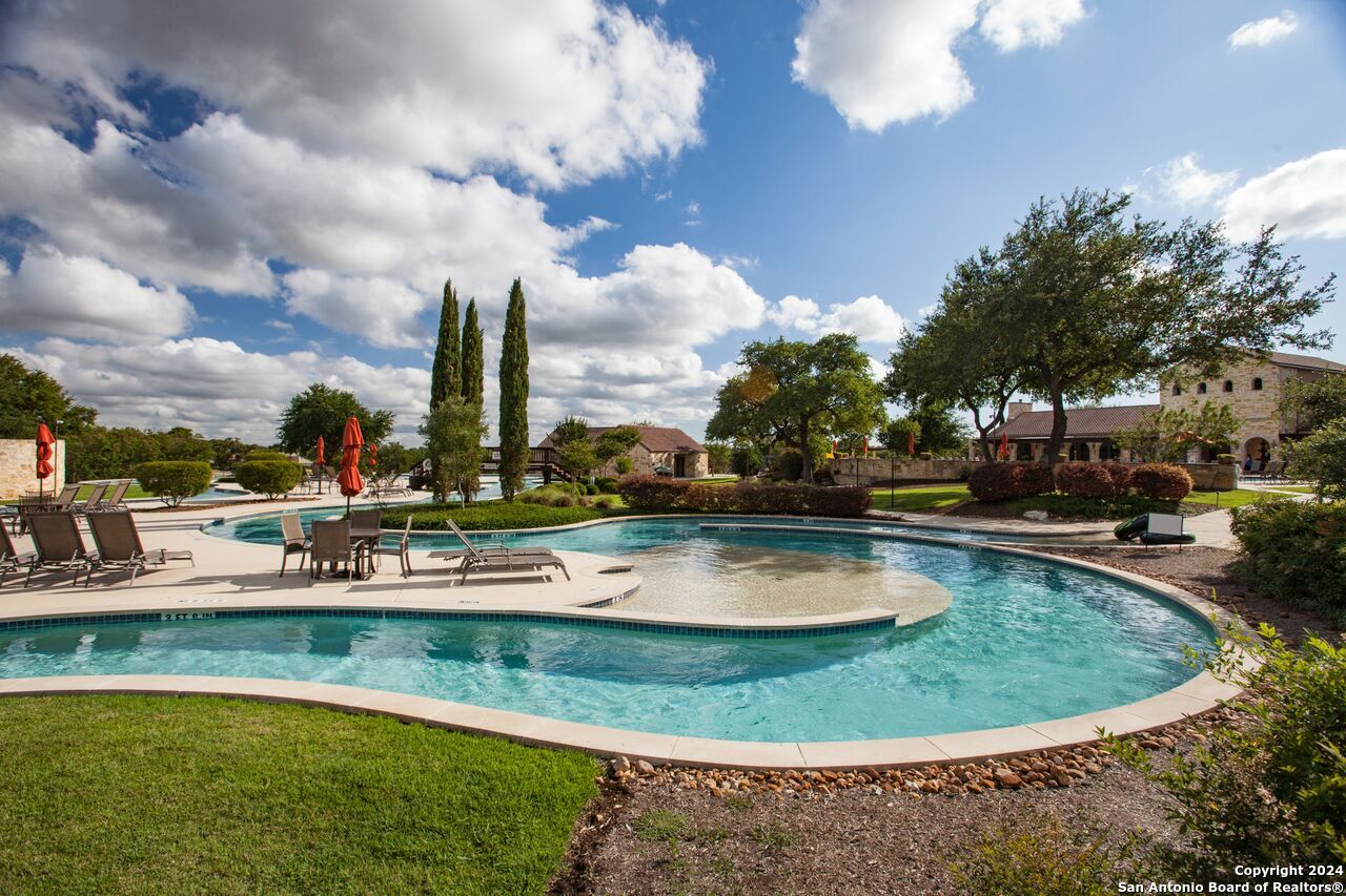 1416 Powder Ridge New Braunfels, TX 78132 - Photo 29 of 33 a view of a swimming pool with outdoor seating