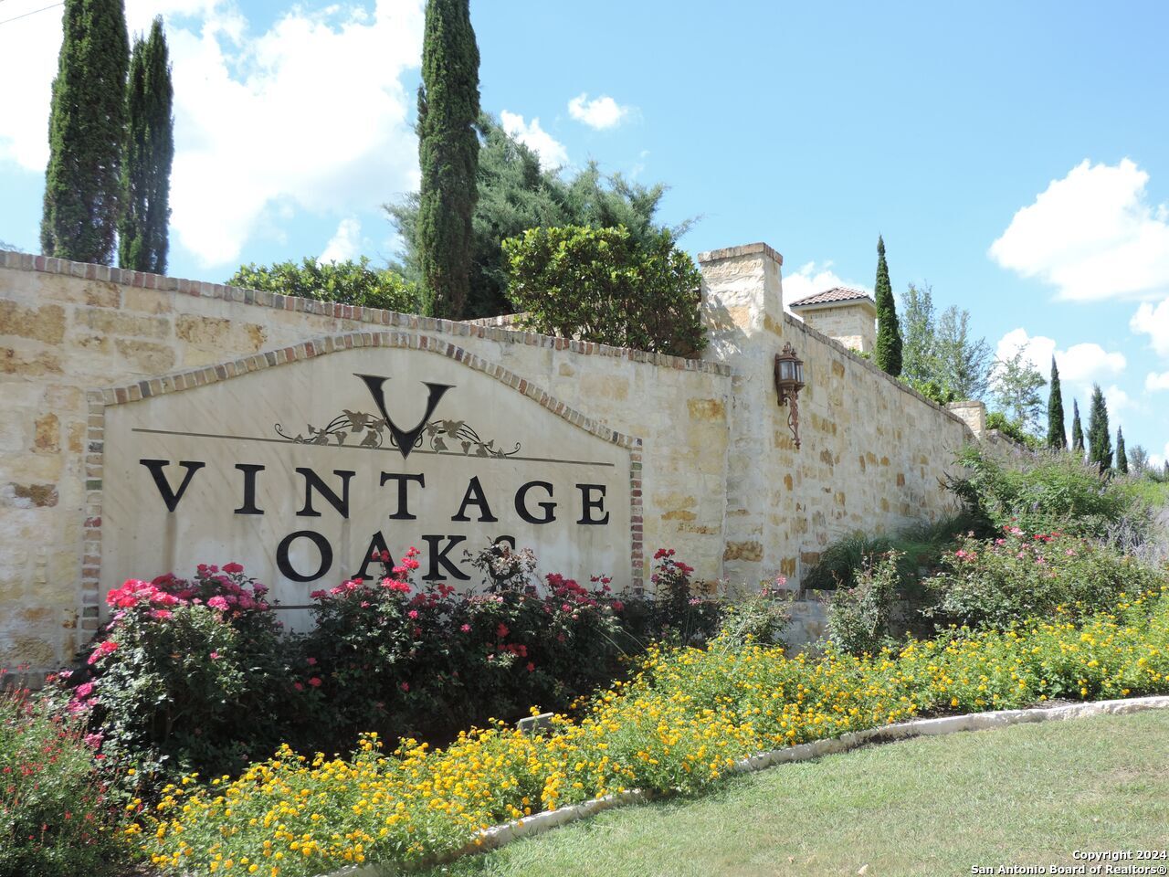 1416 Powder Ridge New Braunfels, TX 78132 - Photo 30 of 33 a sign that is in front of flowers