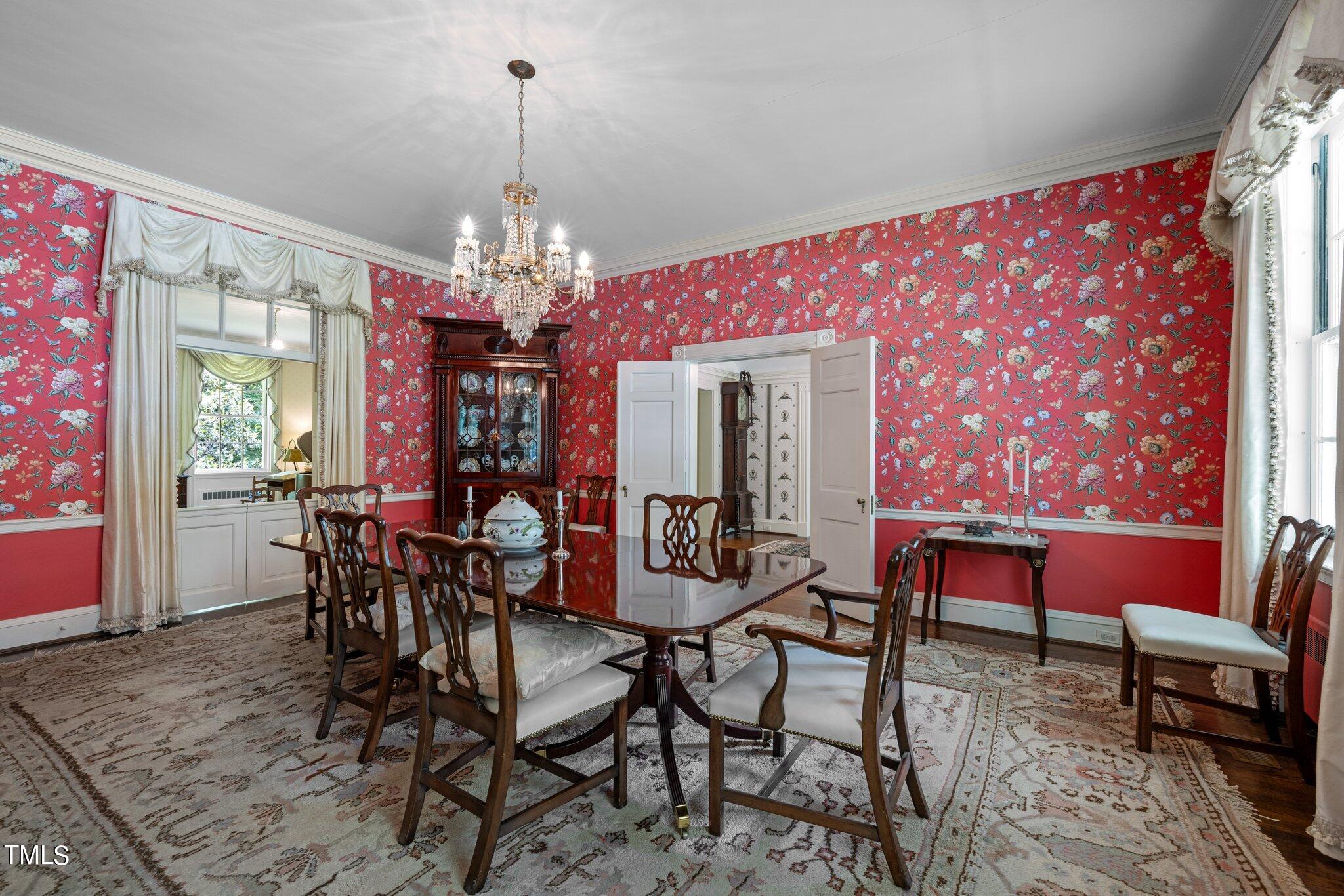 3116 Cornwall Road Durham, NC 27707 - Photo 12 of 85 a view of a dining room with furniture and chandelier