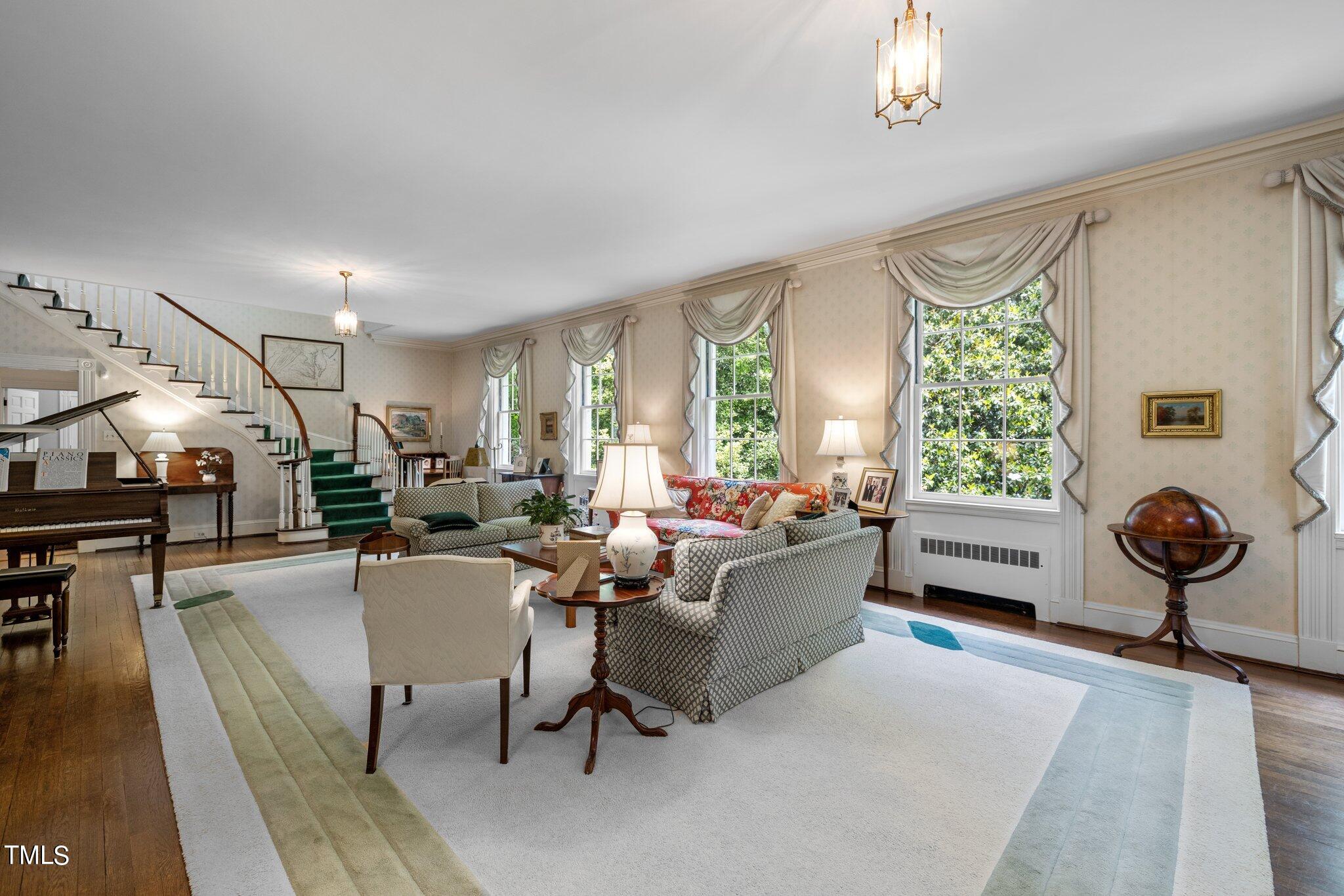 3116 Cornwall Road Durham, NC 27707 - Photo 26 of 85 a living room with furniture and a large window