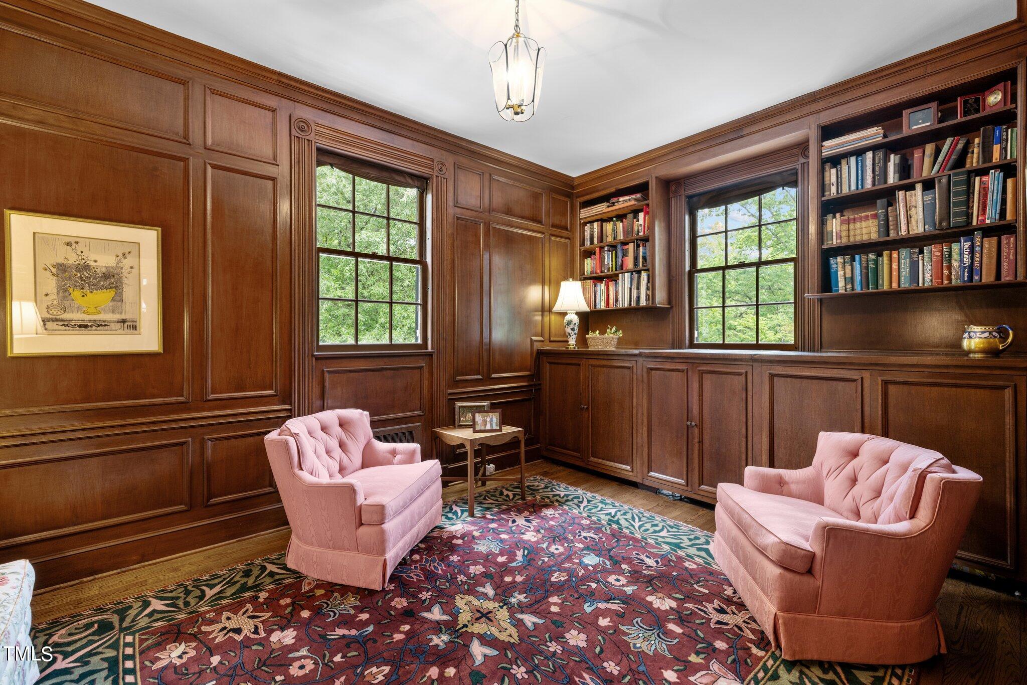 3116 Cornwall Road Durham, NC 27707 - Photo 28 of 85 a living room with furniture a window and a potted plant