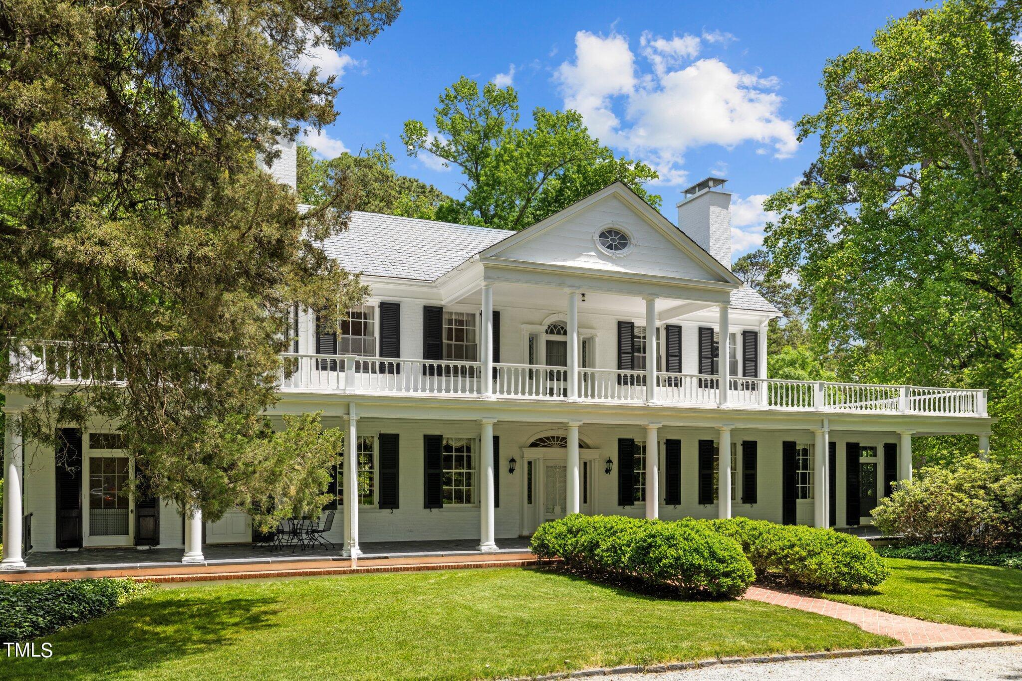 3116 Cornwall Road Durham, NC 27707 - Photo 3 of 85 a front view of a house with a garden