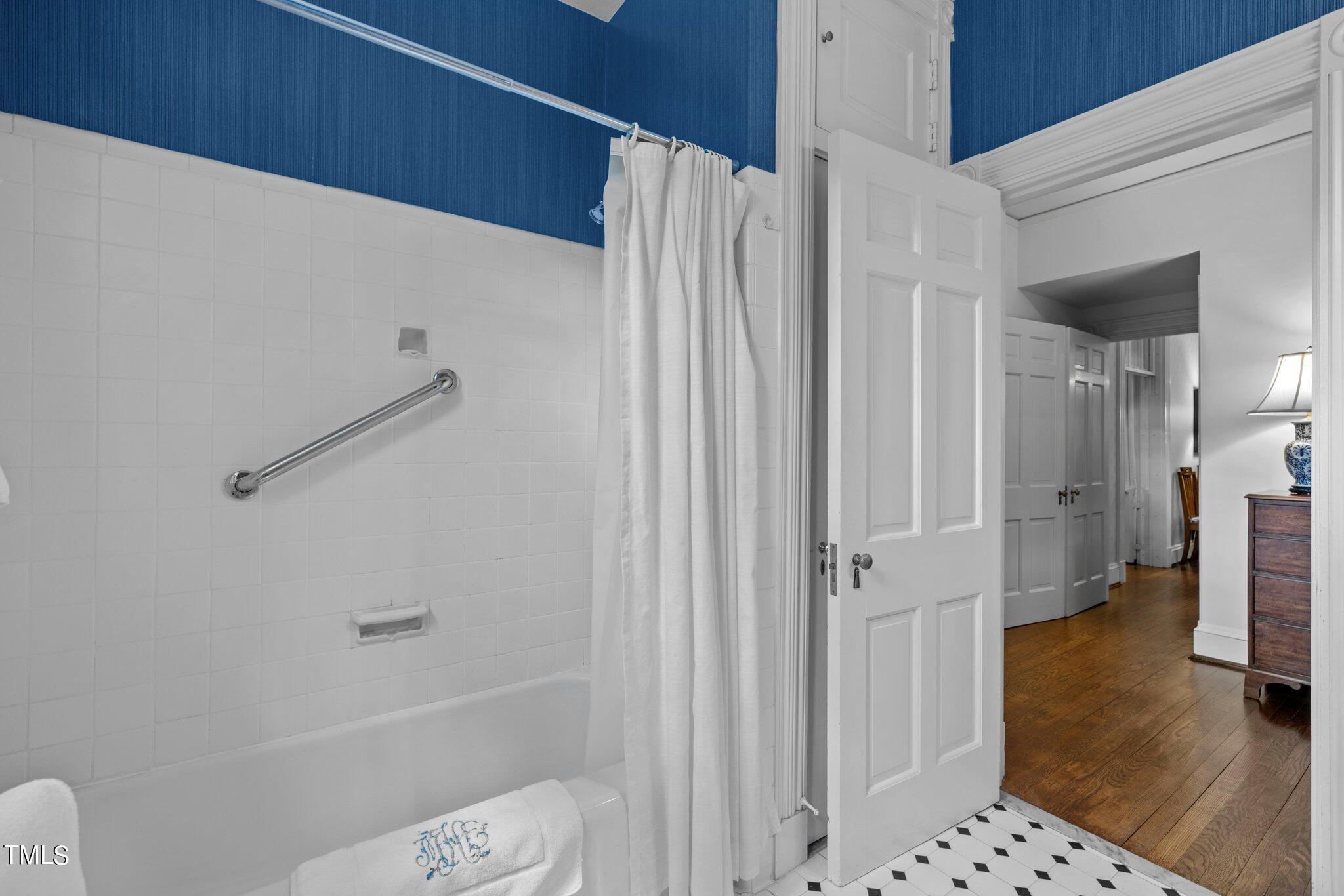 3116 Cornwall Road Durham, NC 27707 - Photo 31 of 85 a bathroom with a shower and a toilet