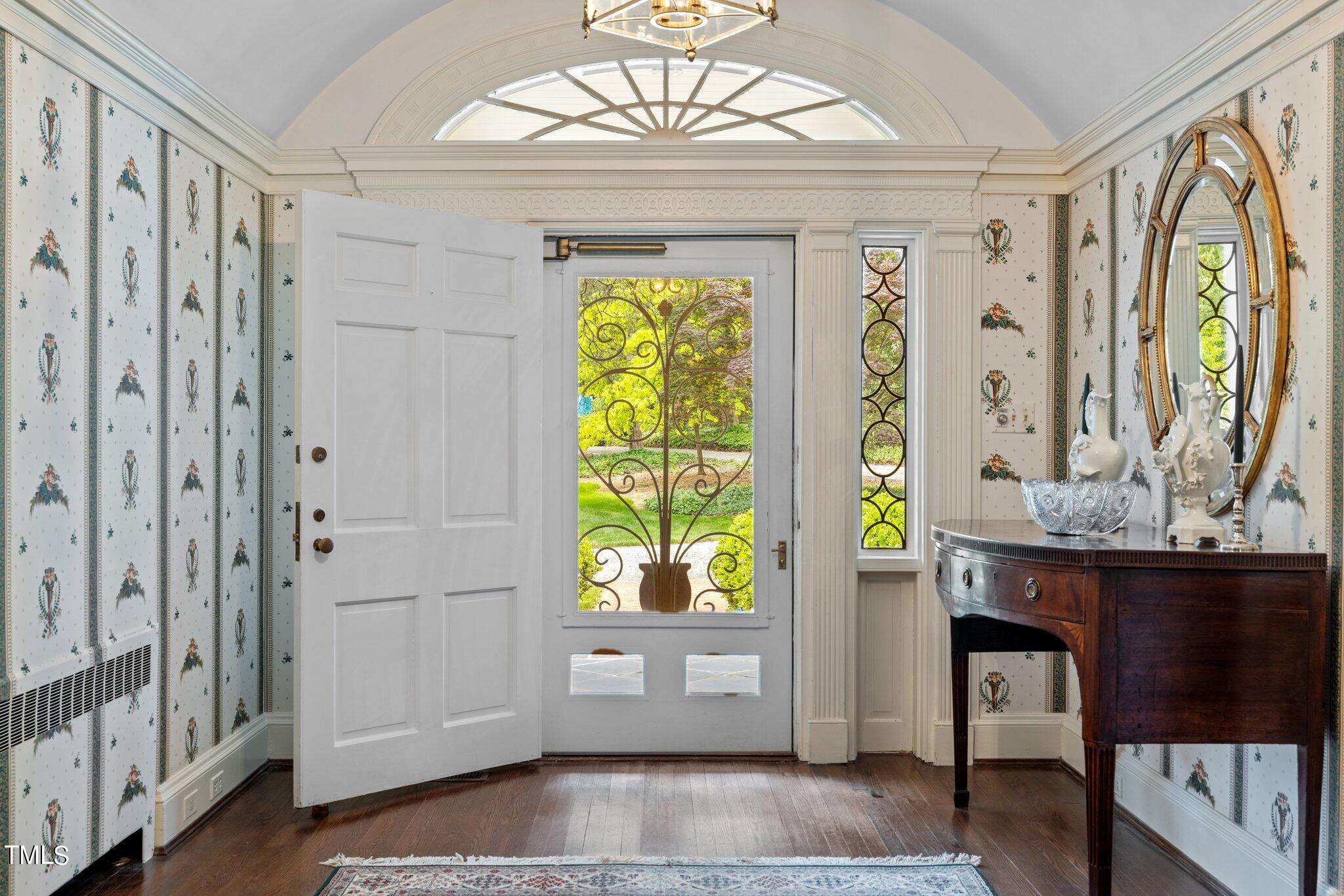 3116 Cornwall Road Durham, NC 27707 - Photo 4 of 85 a view of entryway with a window and wooden floor