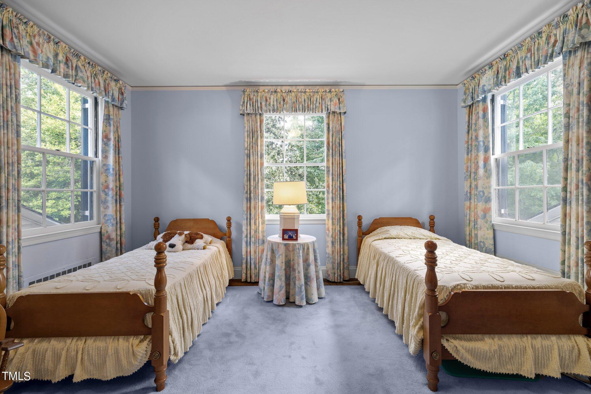 3116 Cornwall Road Durham, NC 27707 - Photo 43 of 85 a bedroom with two beds and a window