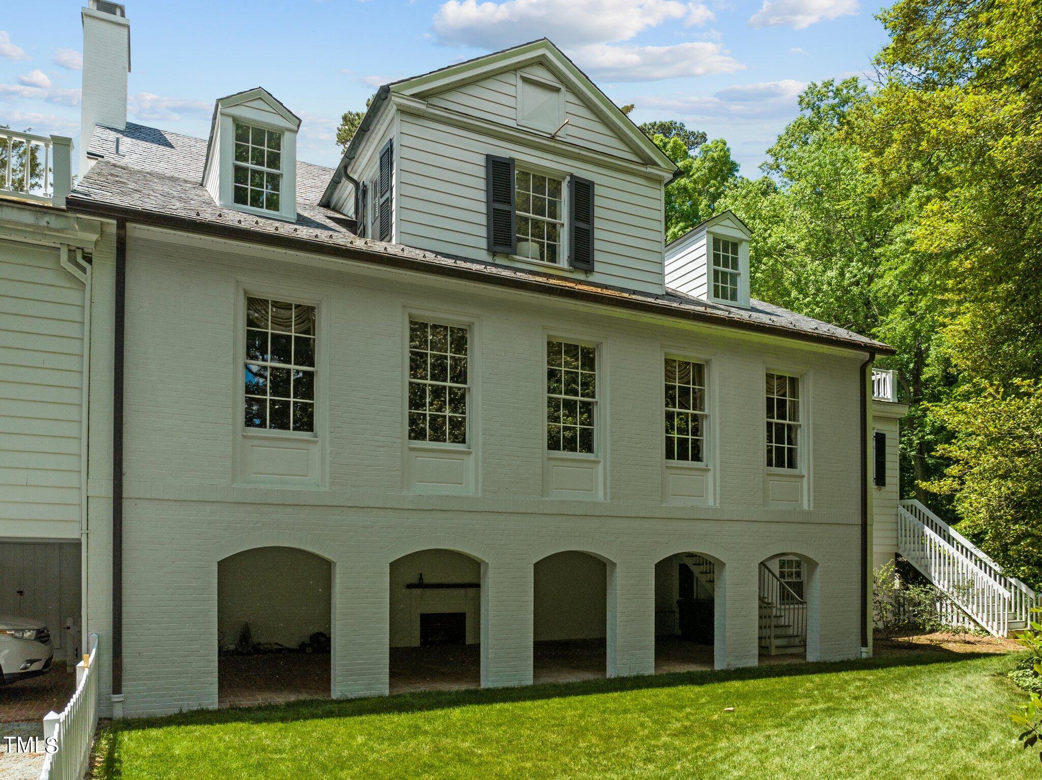 3116 Cornwall Road Durham, NC 27707 - Photo 57 of 85 a front view of a house with garden