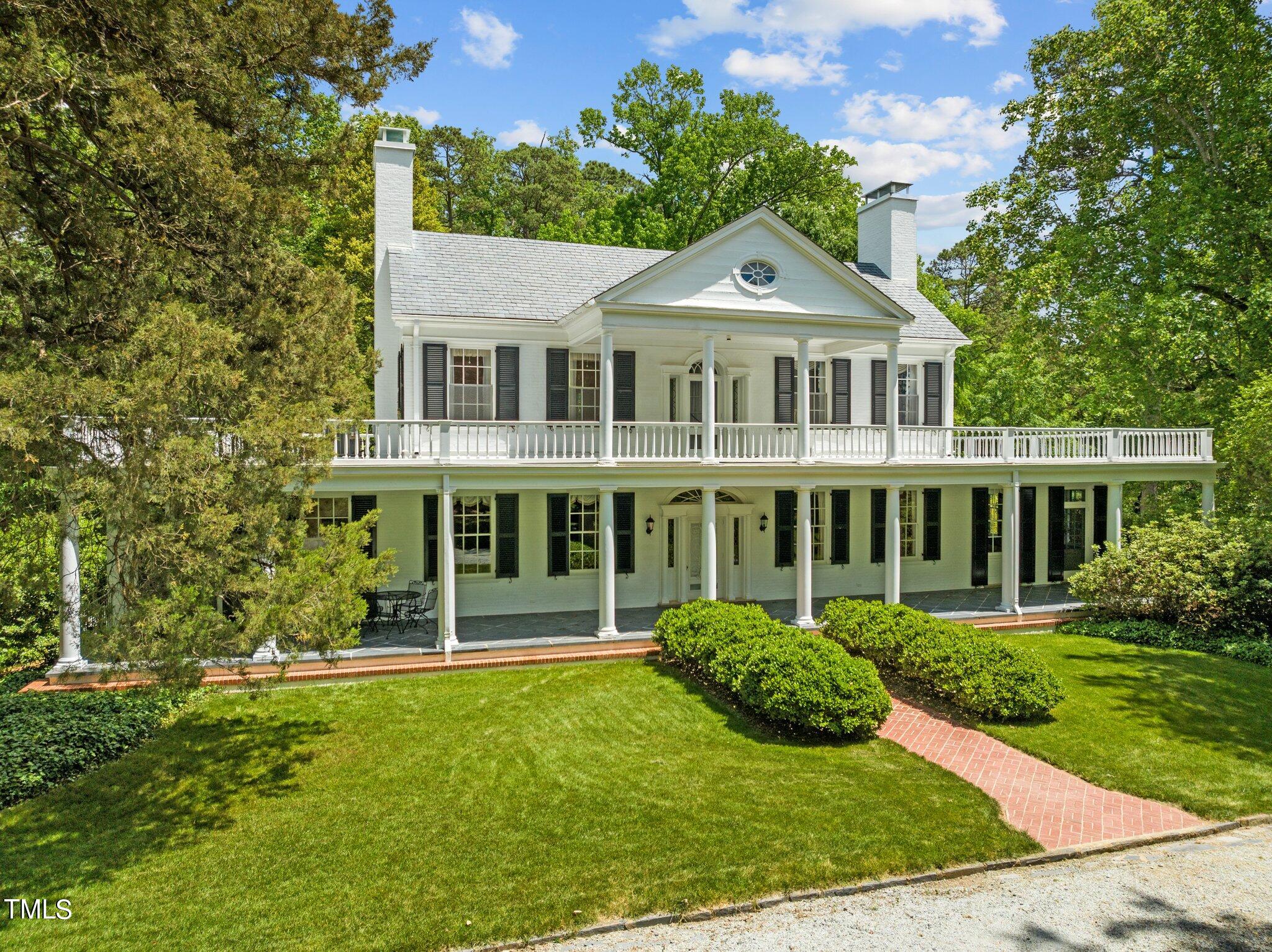 3116 Cornwall Road Durham, NC 27707 - Photo 70 of 85 a front view of a house with a yard
