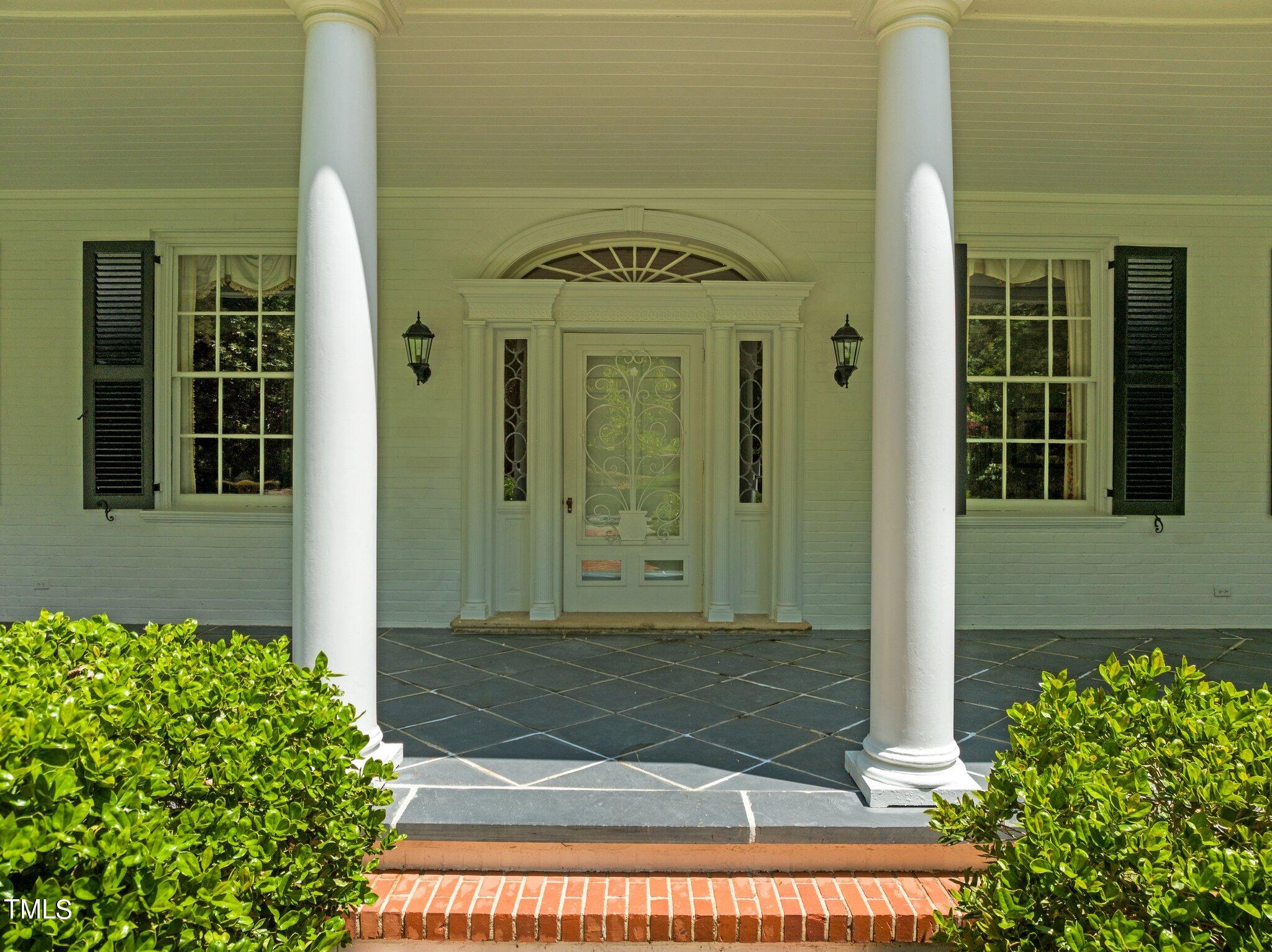 3116 Cornwall Road Durham, NC 27707 - Photo 75 of 85 a view of a entryway door front of house