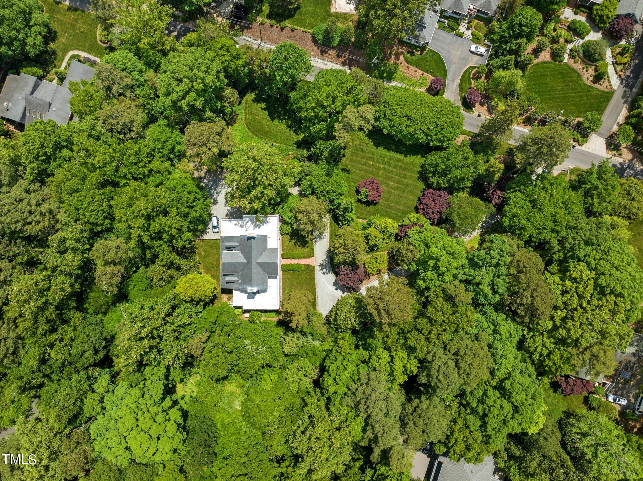 3116 Cornwall Road Durham, NC 27707 - Photo 77 of 85 an aerial view of a house with a yard