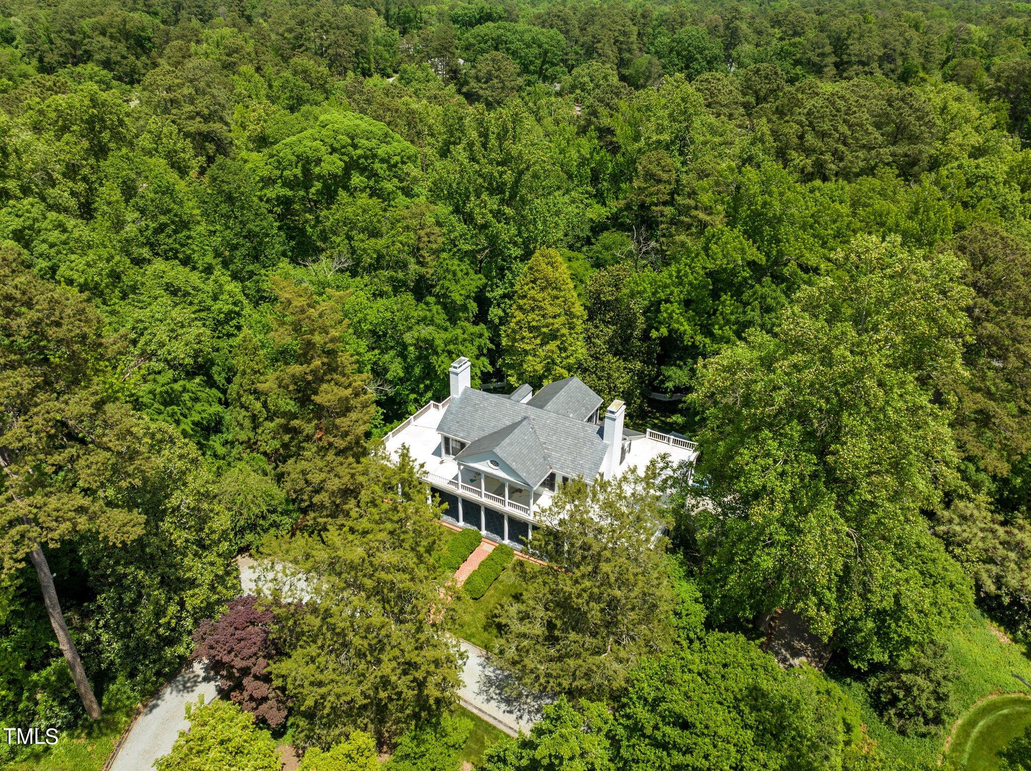 3116 Cornwall Road Durham, NC 27707 - Photo 82 of 85 an aerial view of a house with a yard