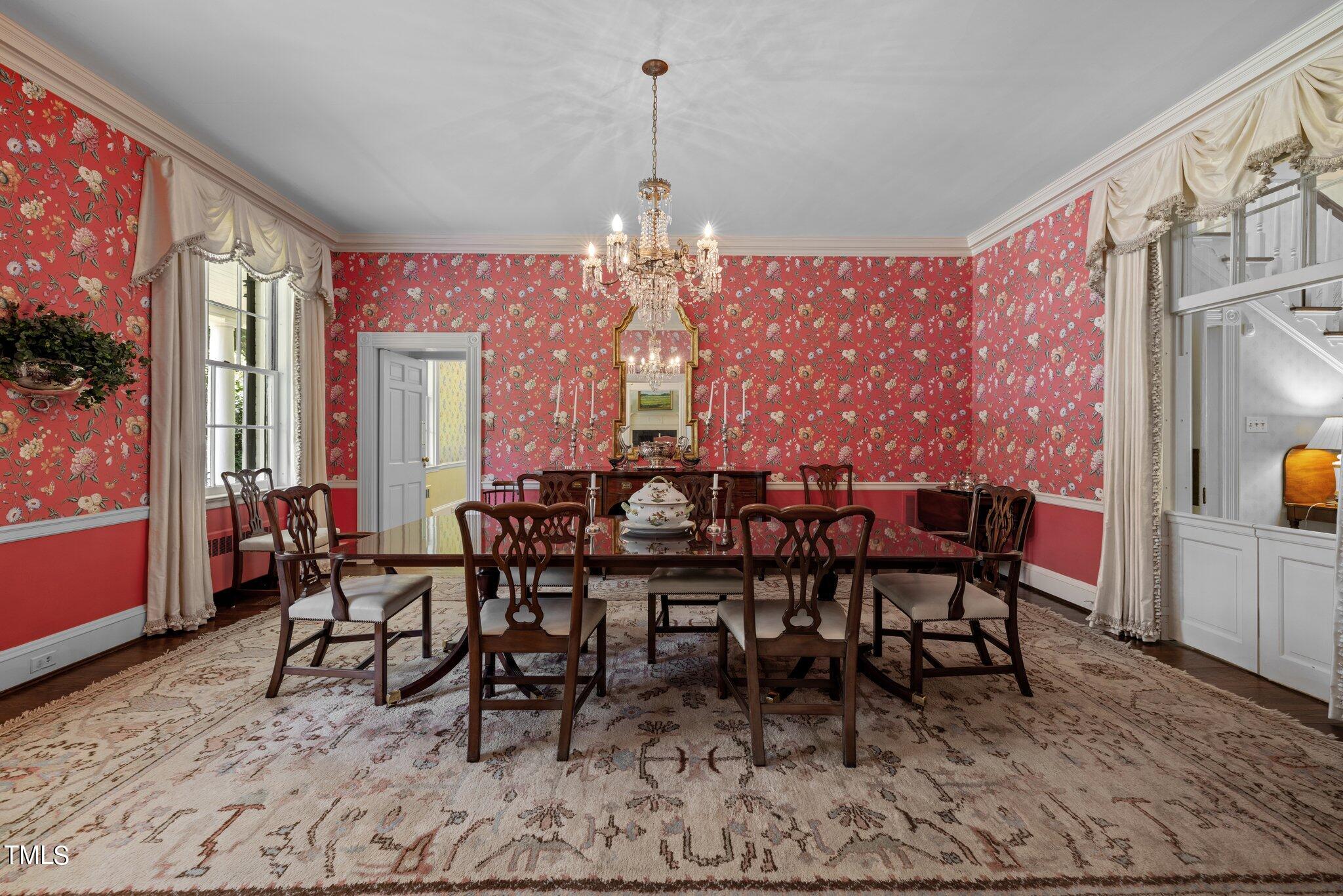 3116 Cornwall Road Durham, NC 27707 - Photo 10 of 85 a view of a dining room with furniture and chandelier