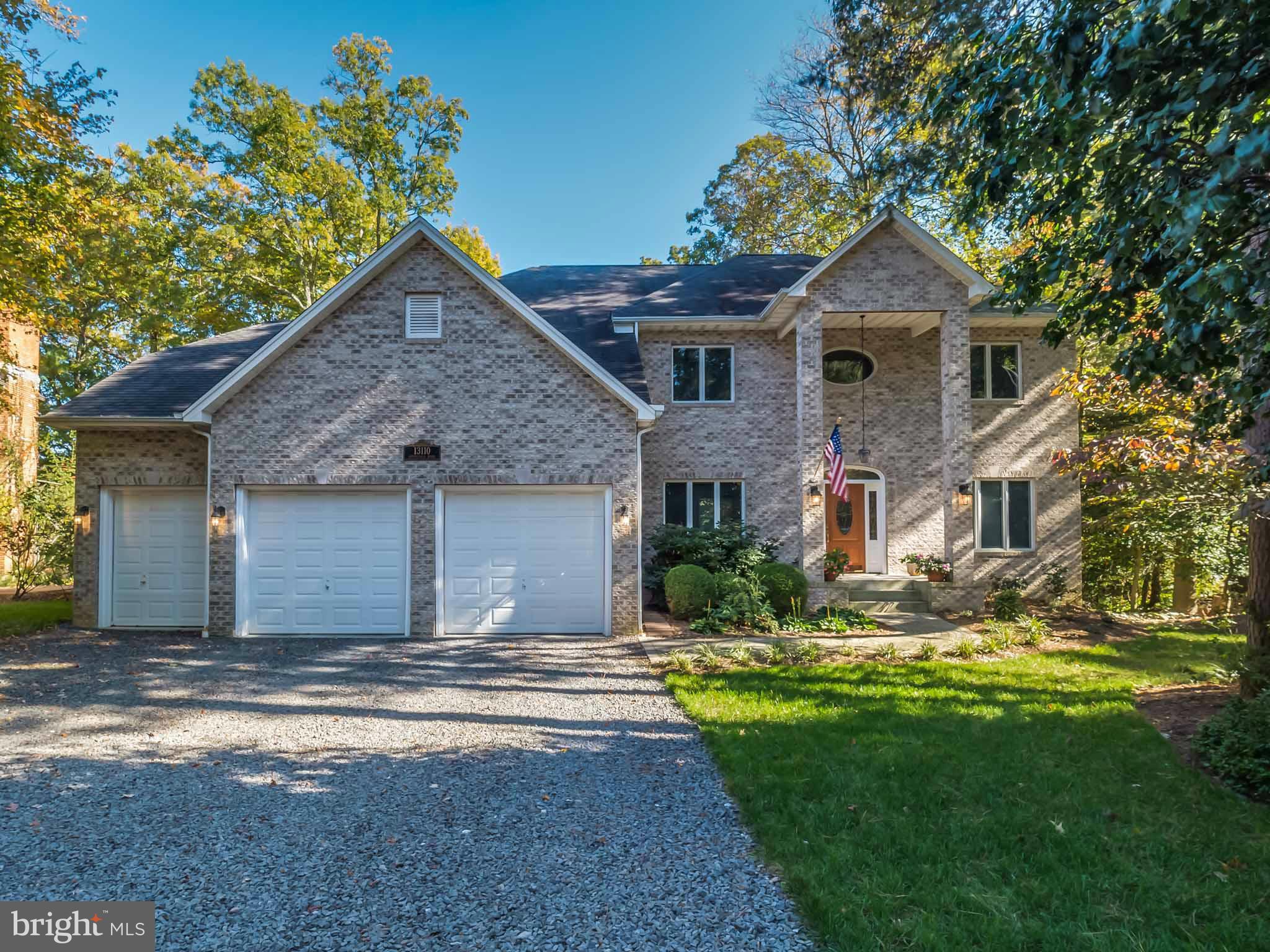 13110 Soundings Road Lusby, MD 20657 - Photo 1 of 30 a front view of a house with a yard