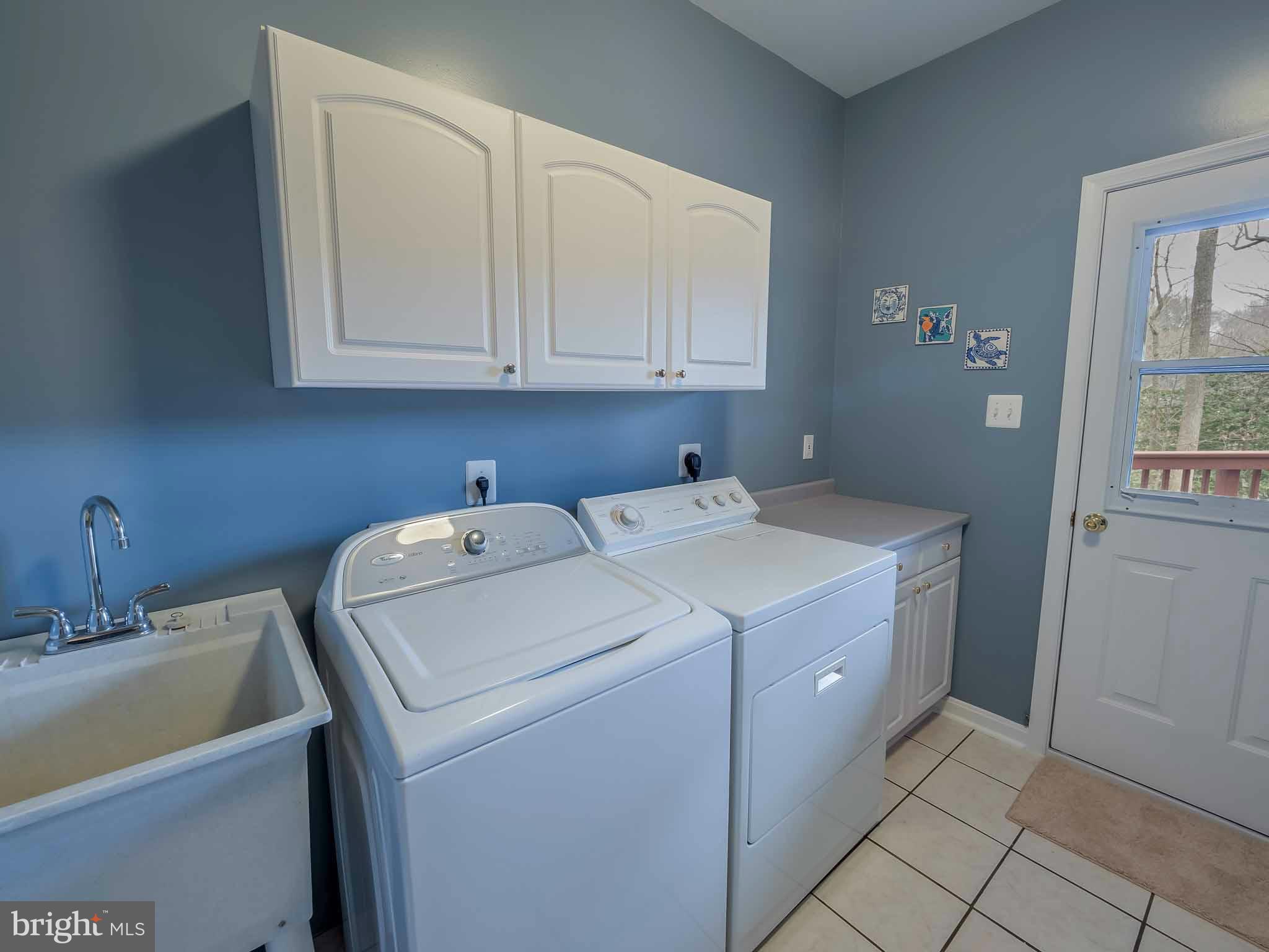 13110 Soundings Road Lusby, MD 20657 - Photo 14 of 30 a utility room with dryer and washer