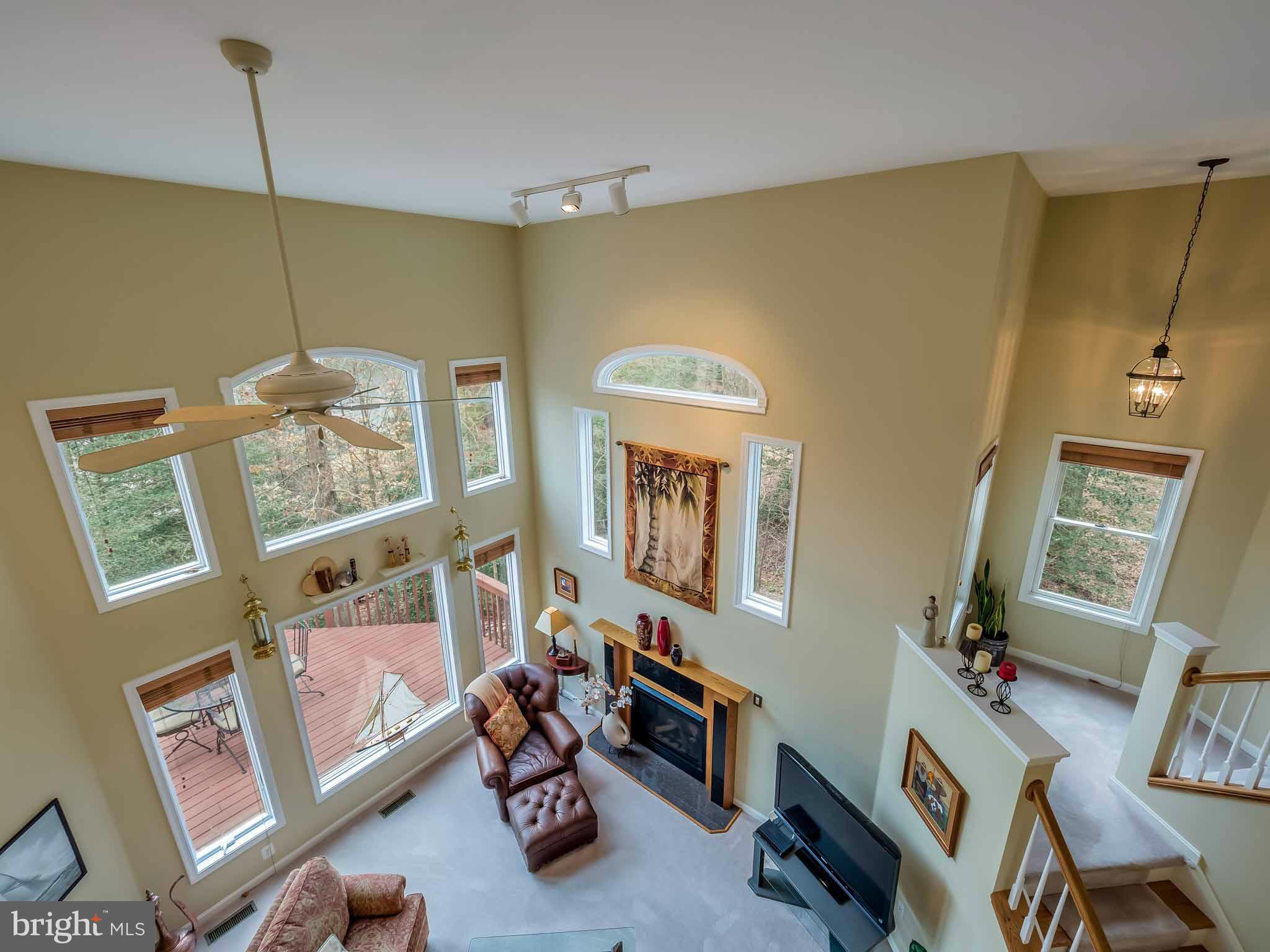 13110 Soundings Road Lusby, MD 20657 - Photo 17 of 30 a living room with furniture and a window