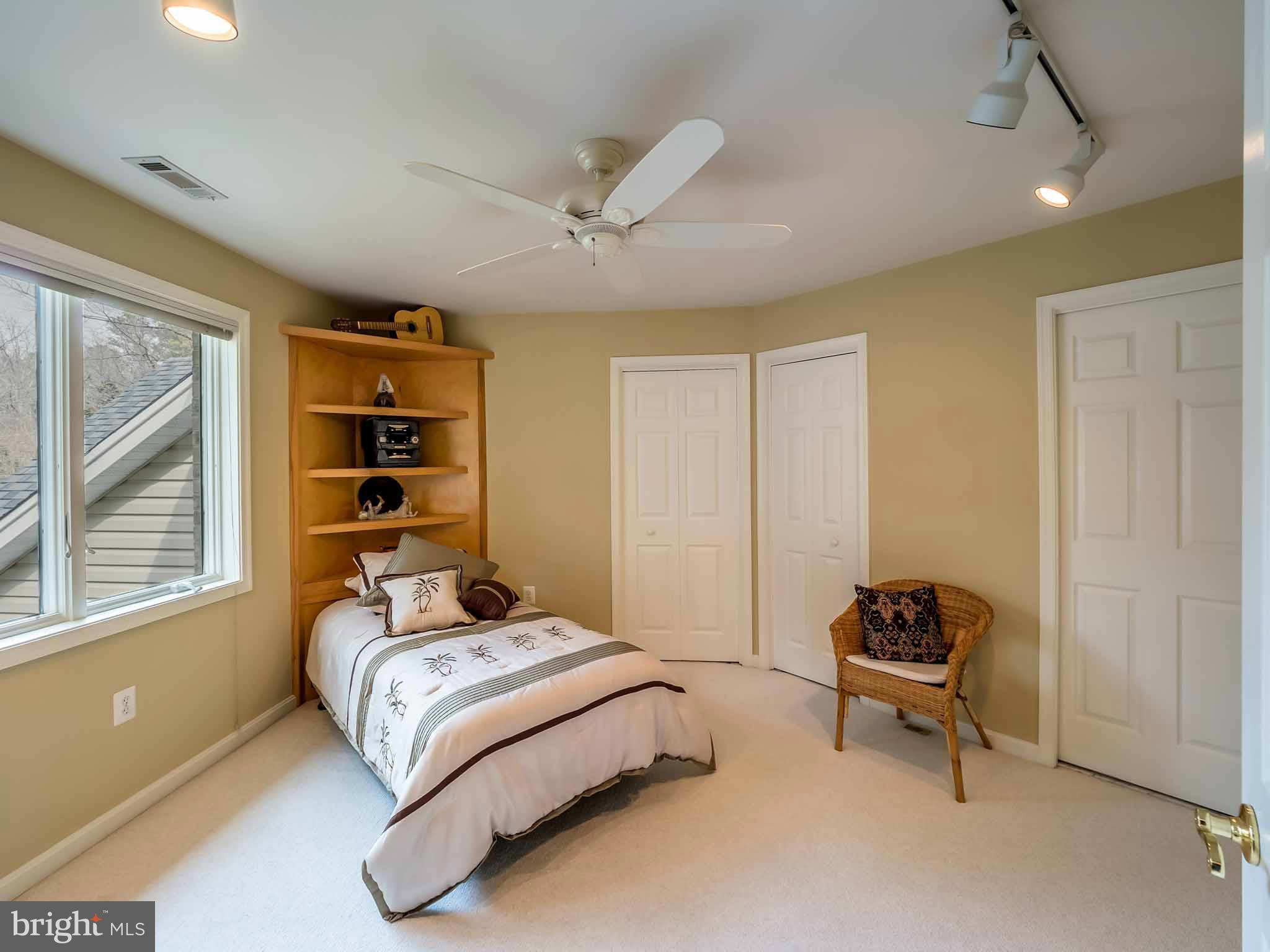 13110 Soundings Road Lusby, MD 20657 - Photo 18 of 30 a bedroom with a bed and a window