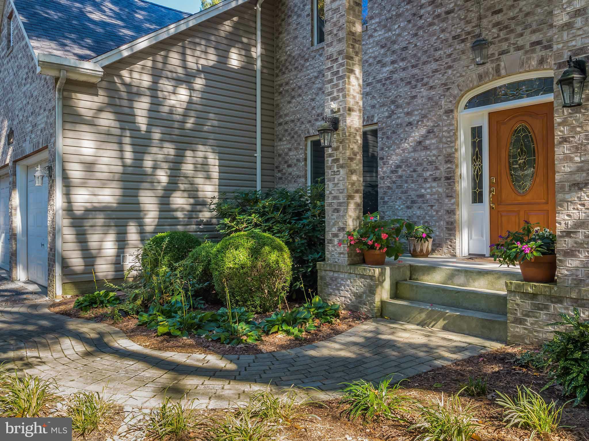 13110 Soundings Road Lusby, MD 20657 - Photo 3 of 30 a view of house with yard and outdoor space