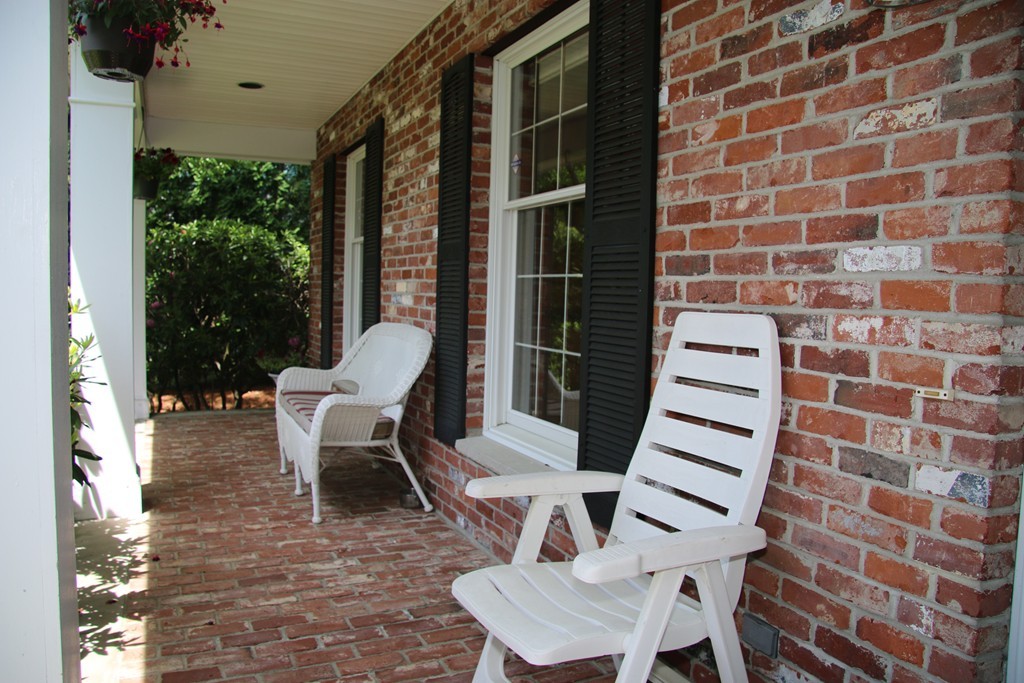 a view of outdoor space with chairs