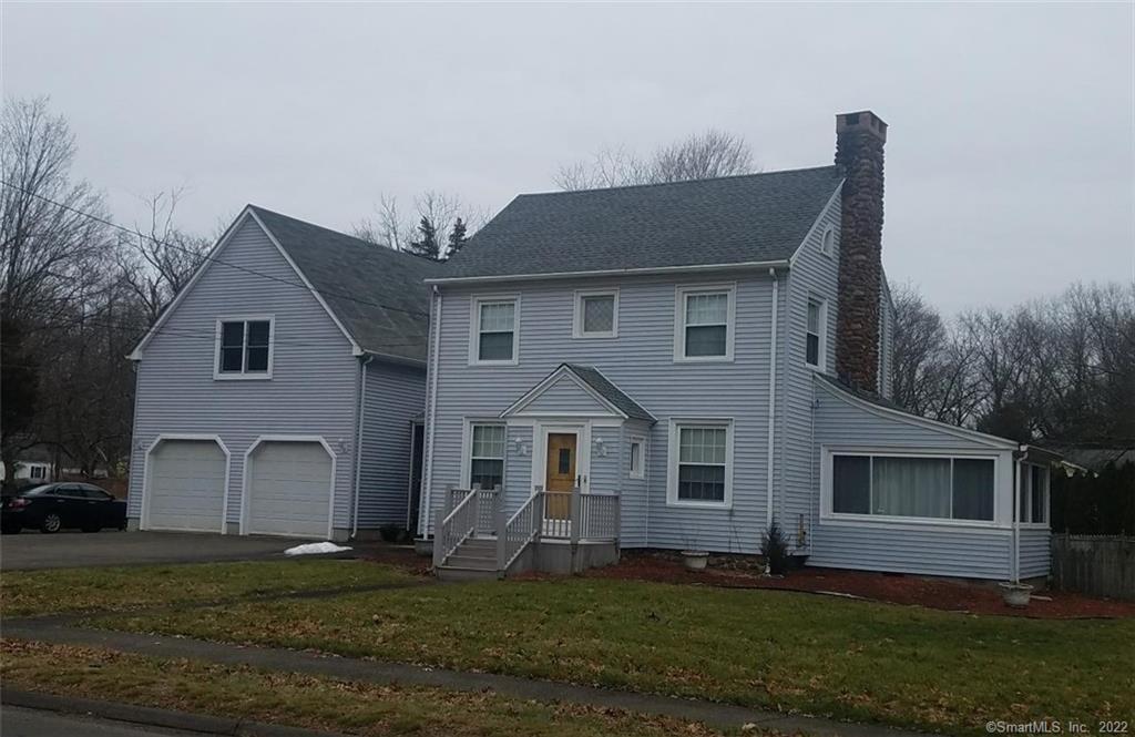 14 Pool Road North Haven, CT 06473 - Photo 1 of 1 a front view of a house with a garden