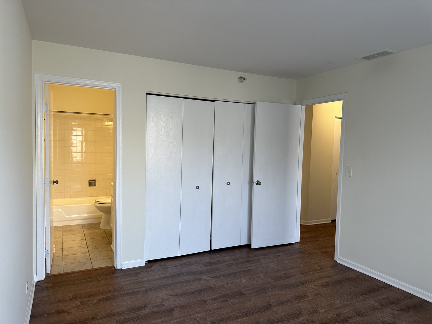 1361 Orleans Drive Mundelein, IL 60060 - Photo 11 of 13 a view of an empty room with wooden floor and a window