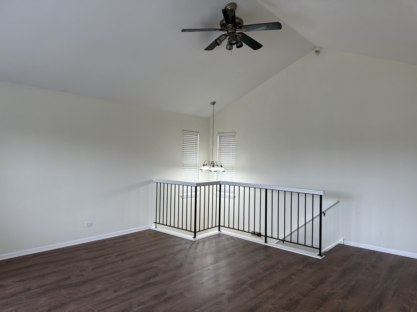 1361 Orleans Drive Mundelein, IL 60060 - Photo 4 of 13 a view of a hallway with wooden floor and windows