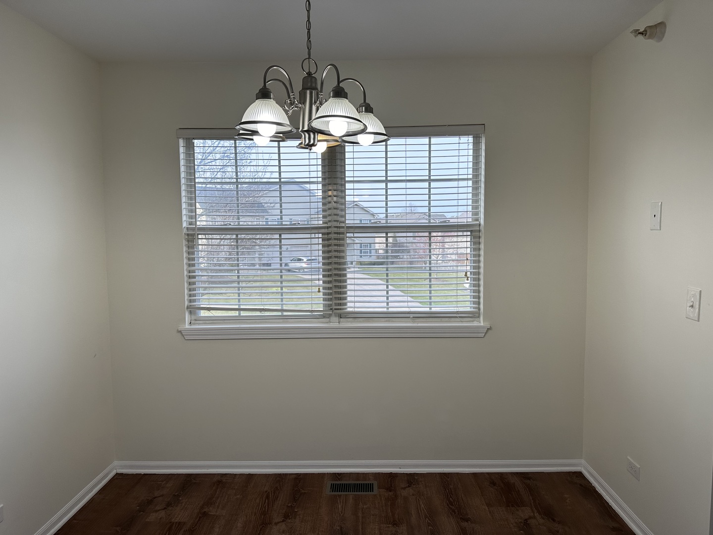 1361 Orleans Drive Mundelein, IL 60060 - Photo 8 of 13 a view of a windows and chandelier in a room