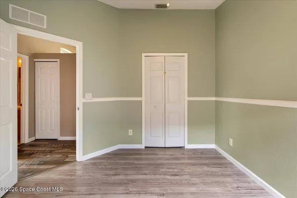 a view of a swimming pool and an outdoor space