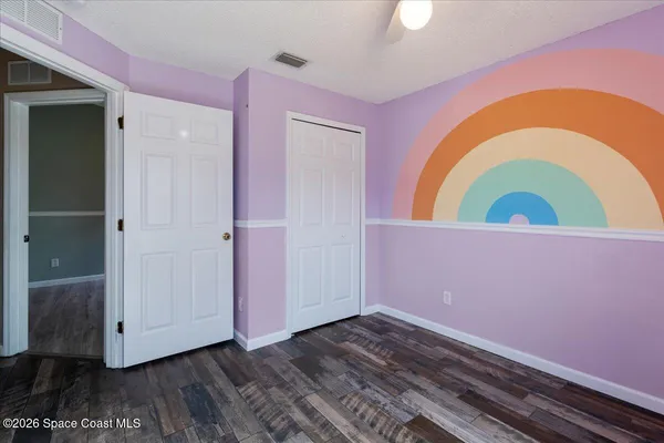 a view of a swimming pool with a lounge chair
