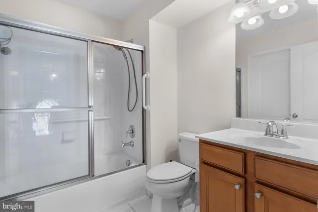 a view of a house with backyard sitting area and garden