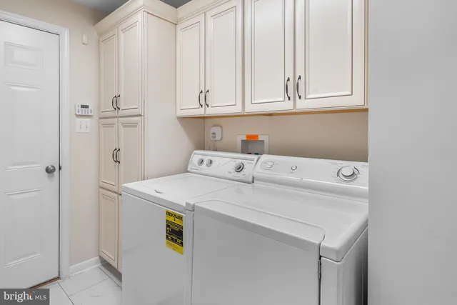 a view of a house with a yard and plants