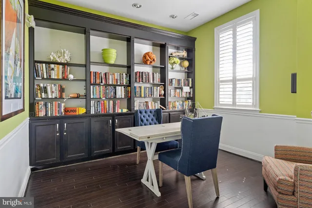 a view of a street with sign on the side of the road