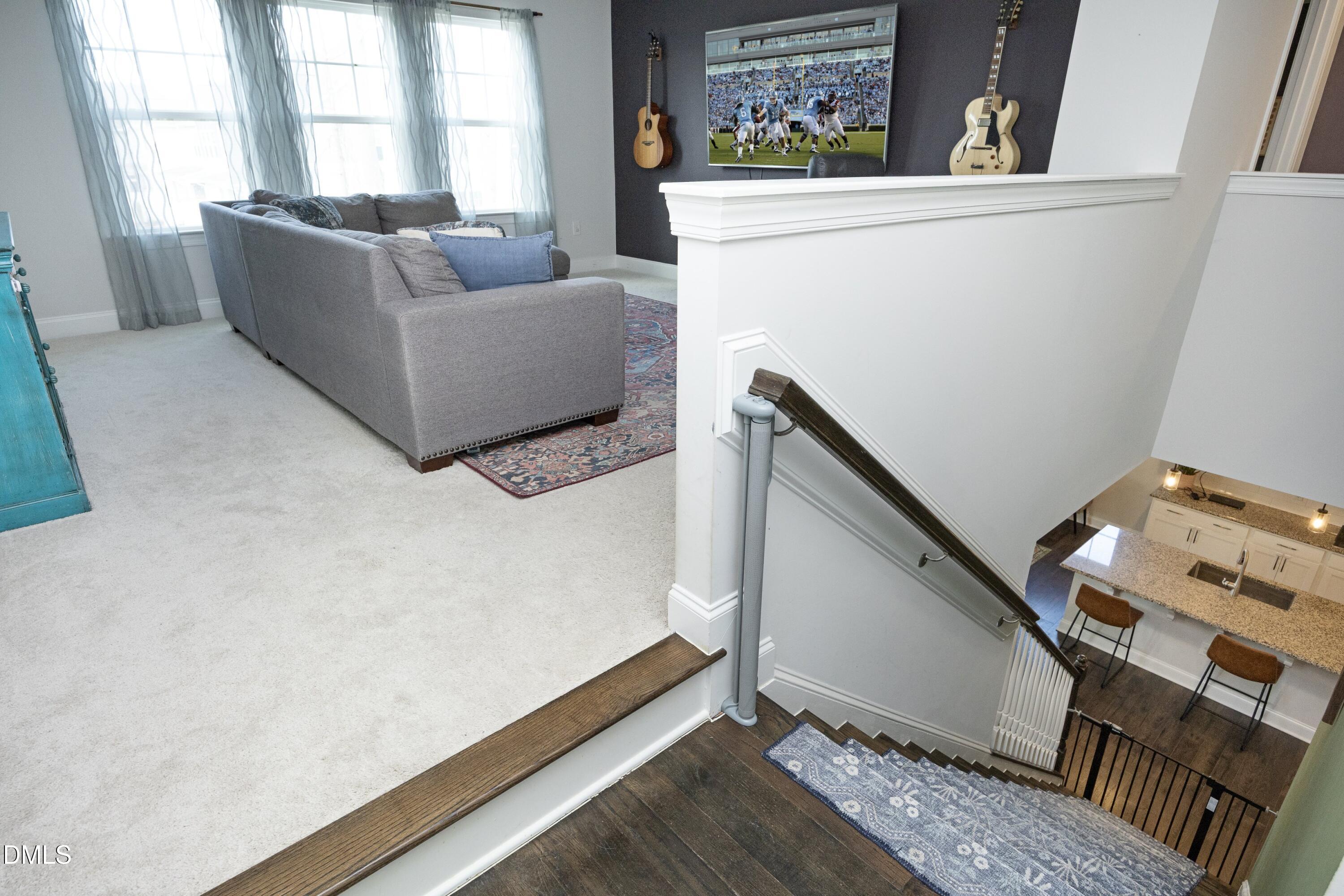 500 Ressler Street Holly Springs, NC 27540 - Photo 16 of 37 a living room with furniture and a window