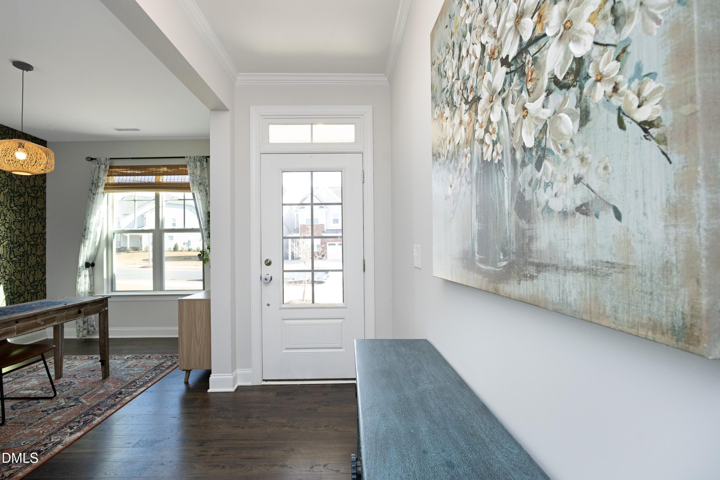 500 Ressler Street Holly Springs, NC 27540 - Photo 22 of 37 an empty room with wooden floor and windows