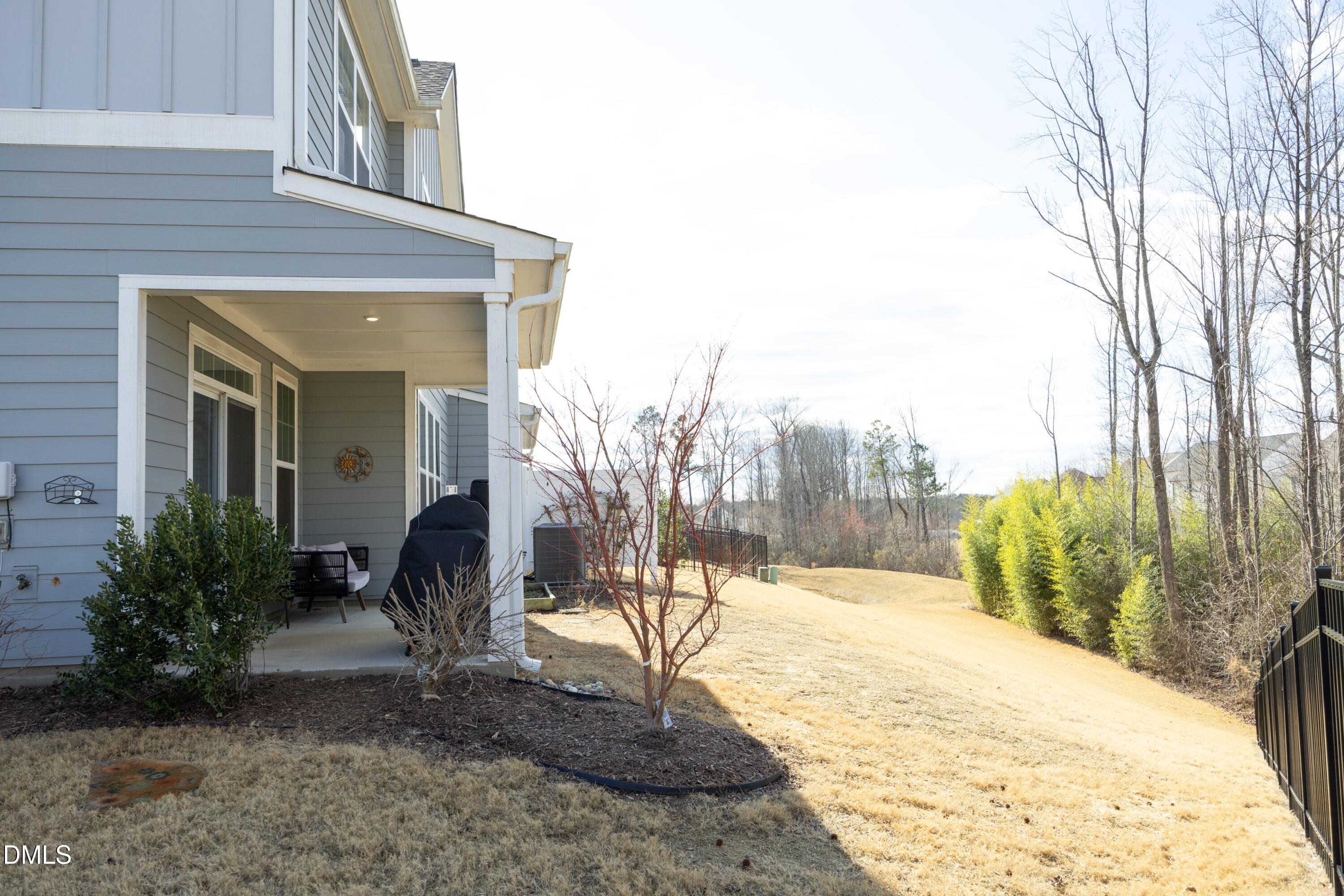 500 Ressler Street Holly Springs, NC 27540 - Photo 28 of 37 a view of a house with a yard
