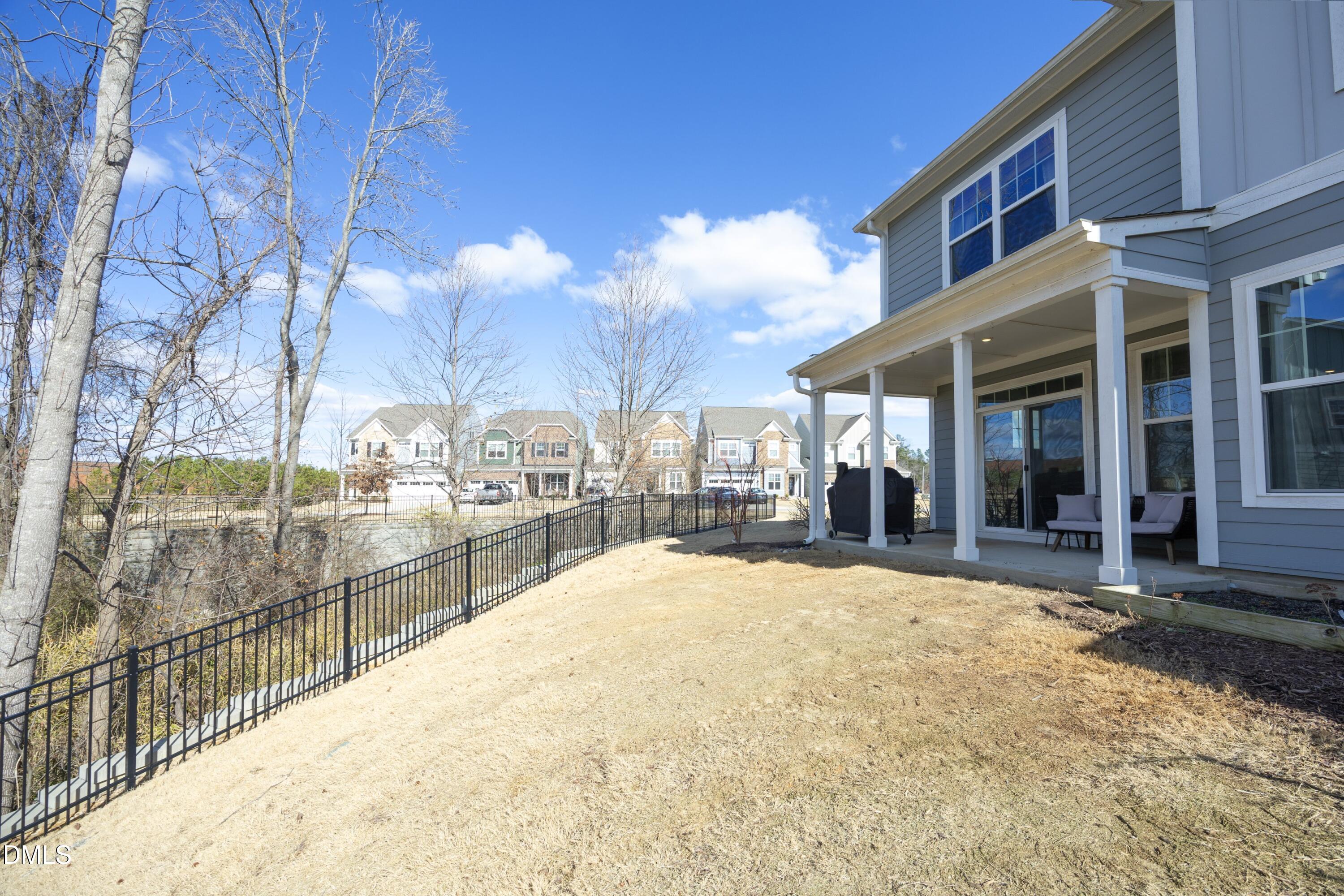 500 Ressler Street Holly Springs, NC 27540 - Photo 29 of 37 a view of a building with a outdoor space