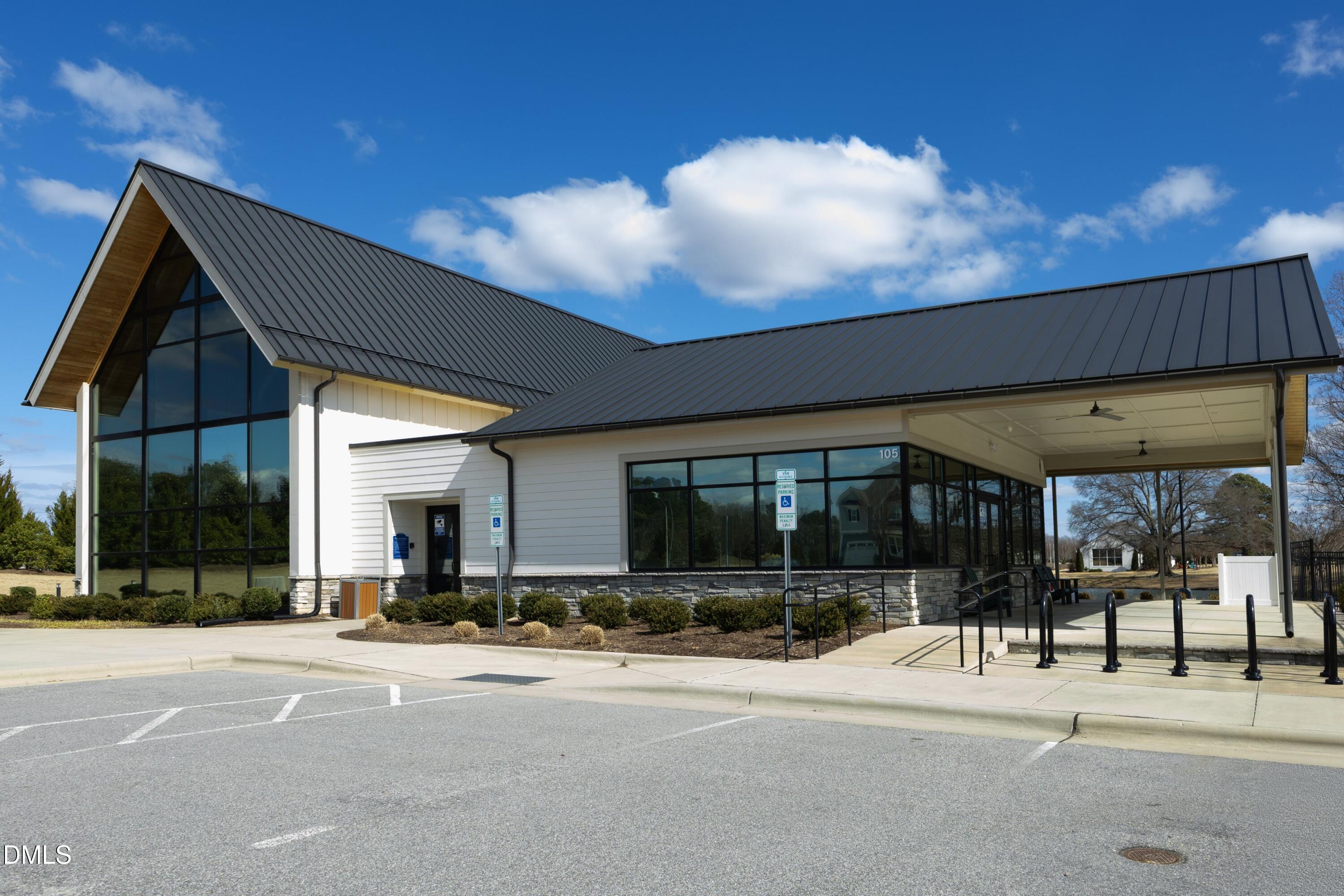 500 Ressler Street Holly Springs, NC 27540 - Photo 31 of 37 a view of a building with a patio